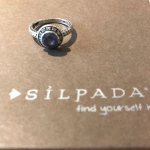 Silpada ring, silver with blue stone featured.